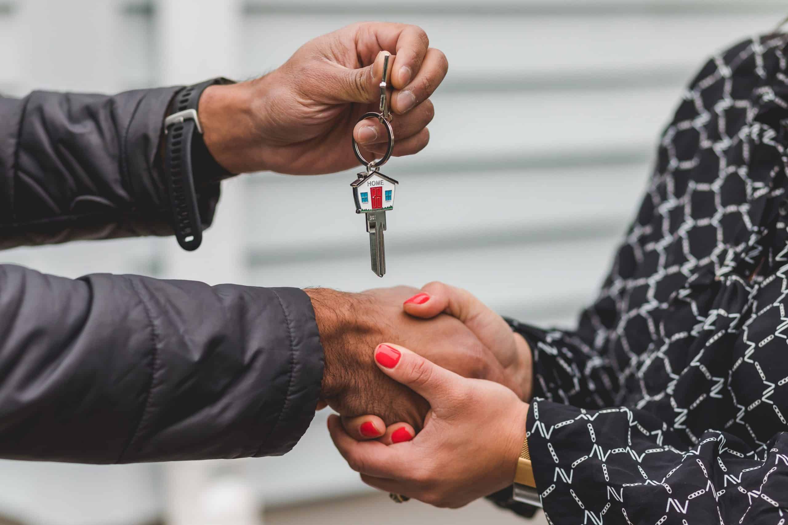 buying property property conveyancing - keys delivered to new house owner